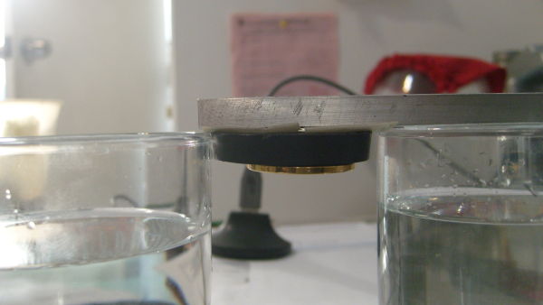 2-Magnetic-Coins?-Glass-Of-Water-Visual-Test.